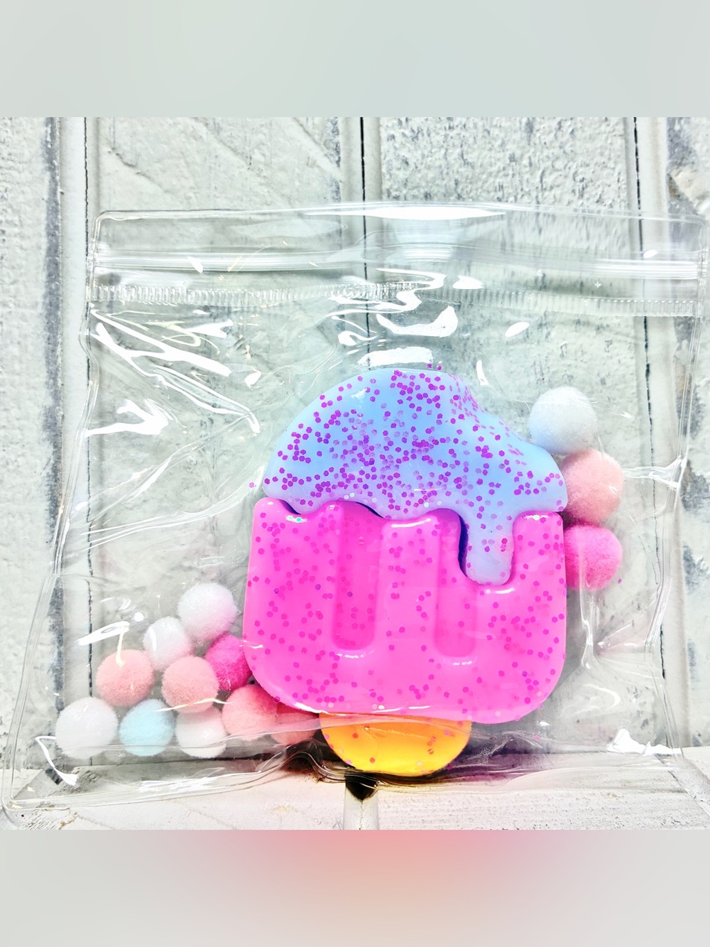 Squishy Toy Pink/Blue Glitter Popsicle W/Colorful Pom Poms Resealable Clear Bag
